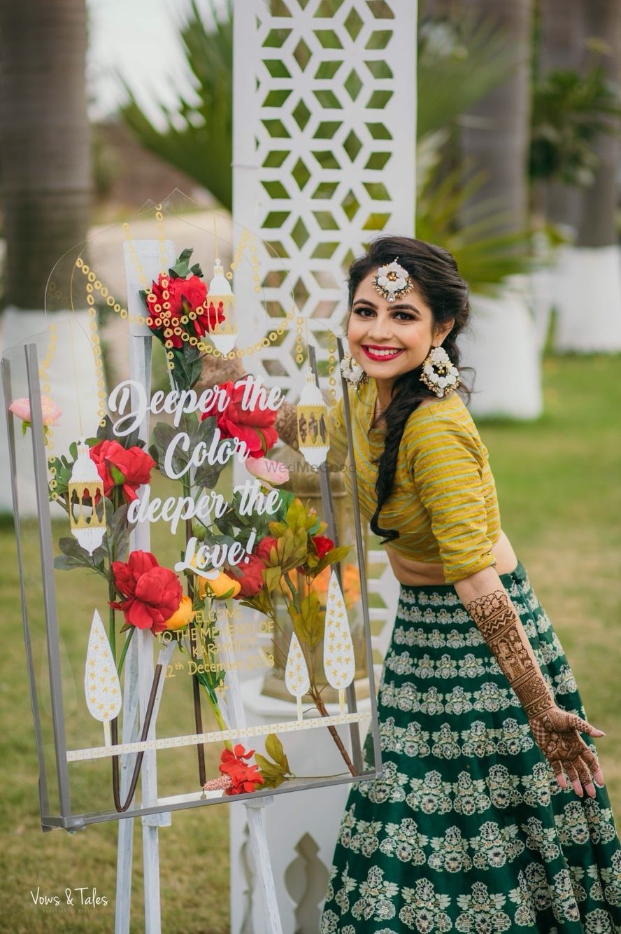 Photo of Mehendi bridal look against cute saying