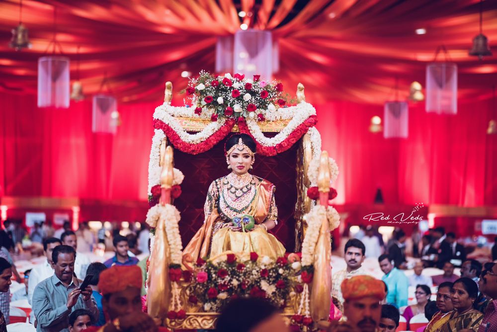 Photo of South inidna bridal entry in Palki