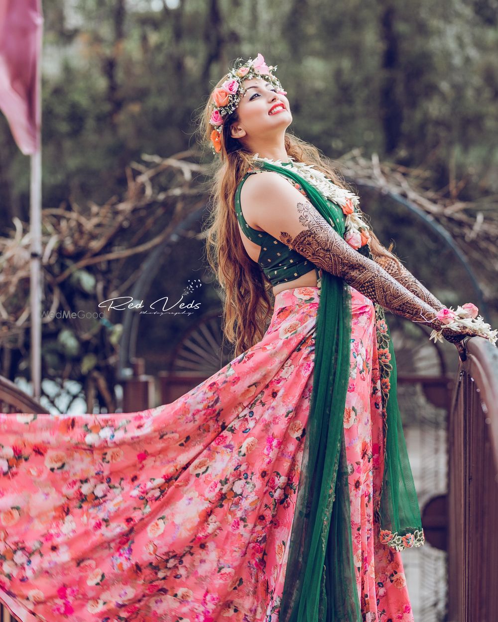 Photo of Floral lehenga mehendi bridal portrait