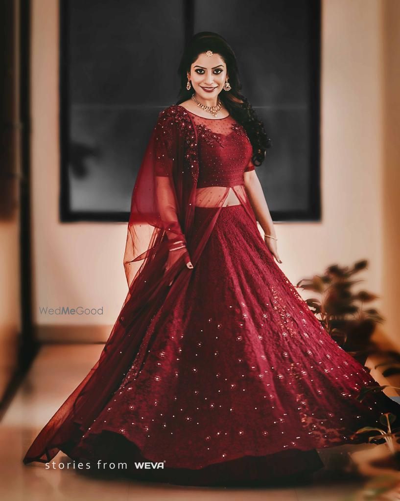 Photo of Maroon lehenga for sangeet with cape