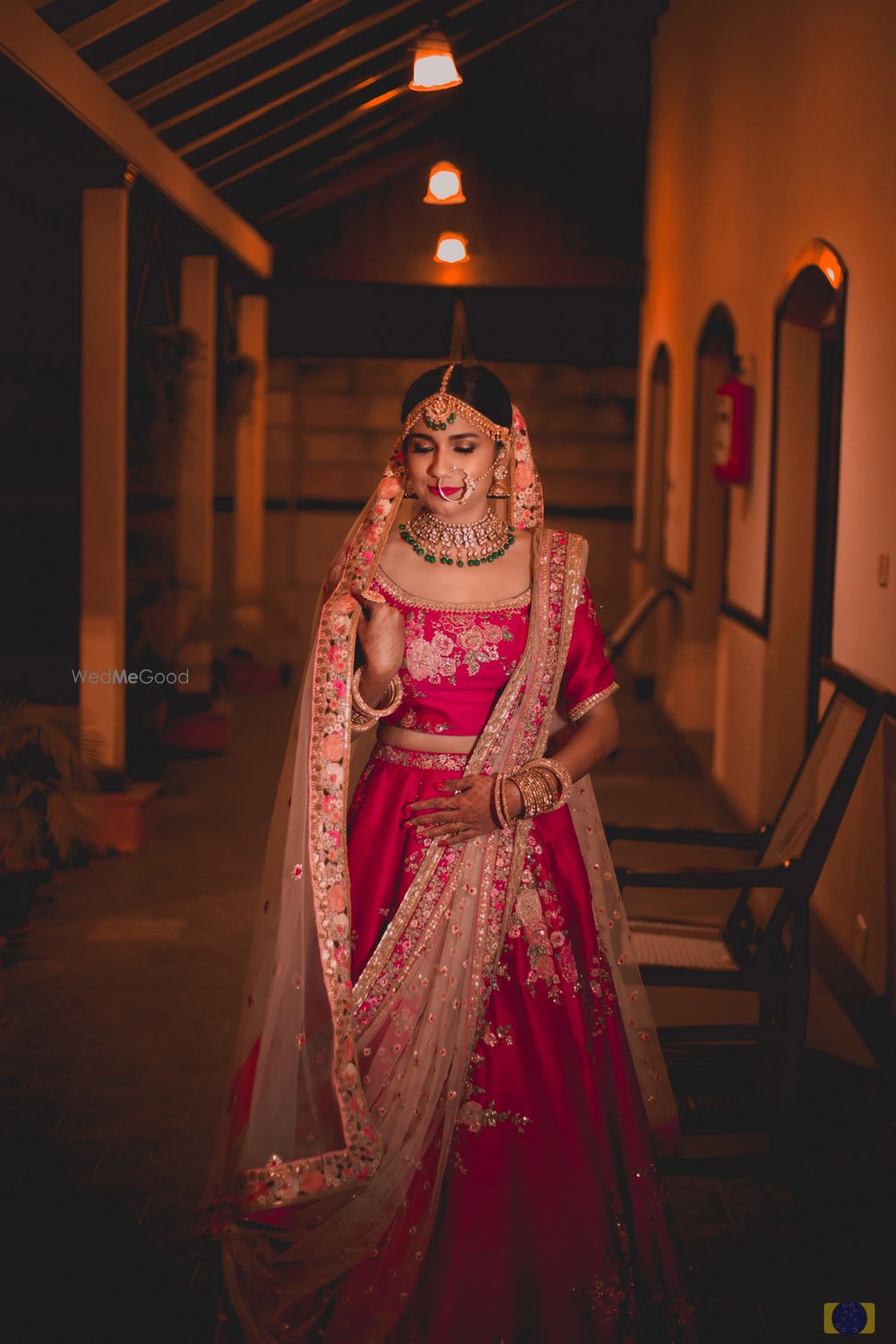 Photo of Minimal red floral print bridal lehenga