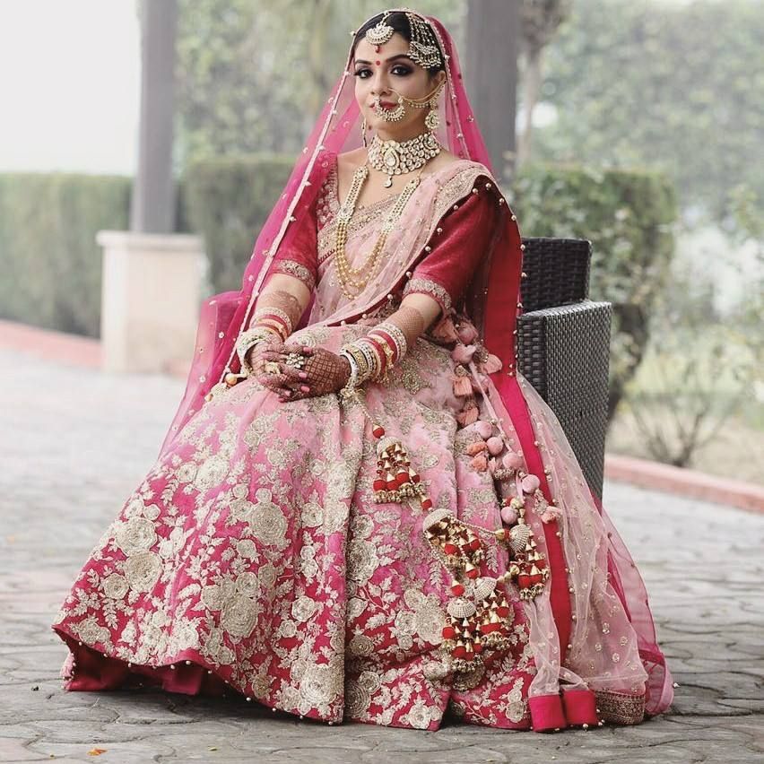 Photo of Floral embroidery lehenga in red and pink ombre
