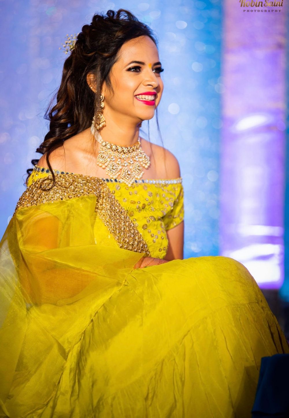 Photo of Mehendi bridal look in yellow off shoulder lehenga