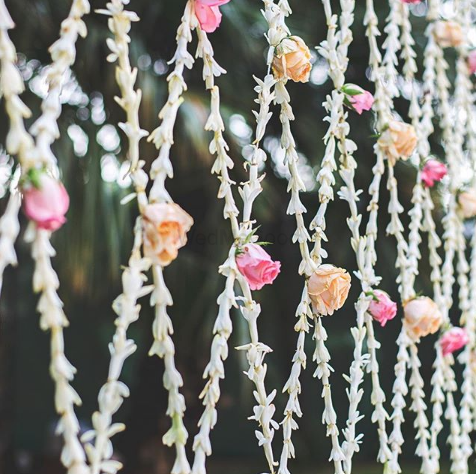 Photo of Pretty floral decor with pink and orange flowers for wedding