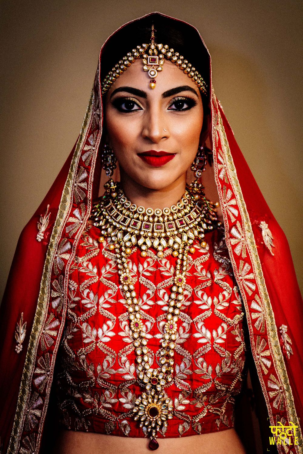 Photo of Bridal jewellery in gold and red