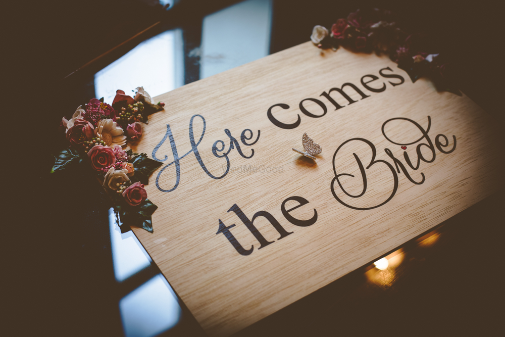 Photo of here comes the bride sign