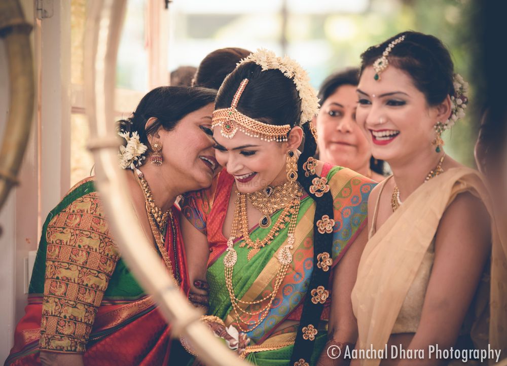 Photo of South Indian Bride with Bridesmaid candid shot