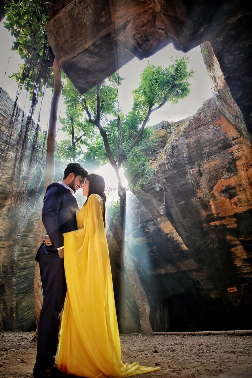 Photo of filmy pre wedding shoot in the forest