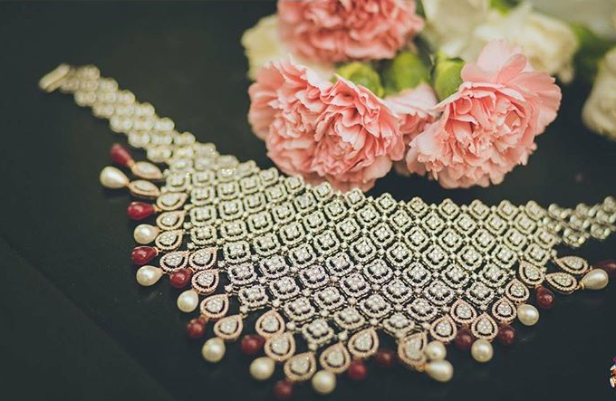 Photo of Pretty diamond jewelry with red beads