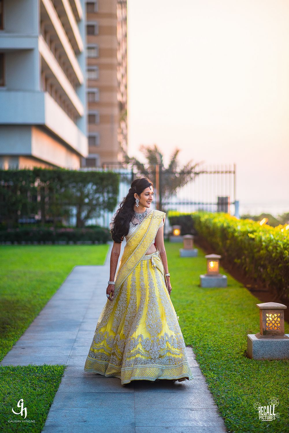 Photo of Yellow Light Lehenga with  Silver Motifs for Engagement