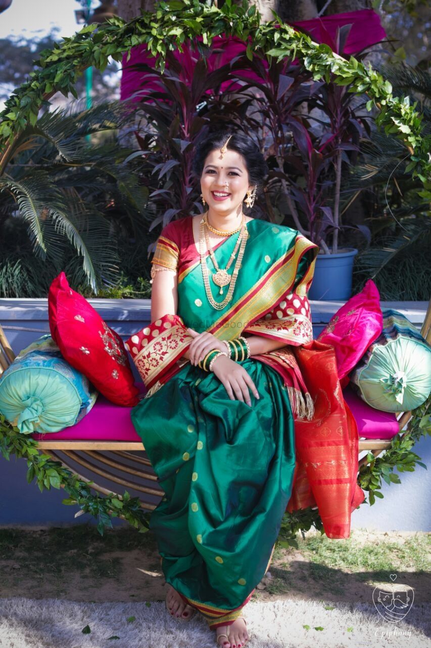 Photo of Pretty maharshtrian bride in green navvari saree and traditional jewellery