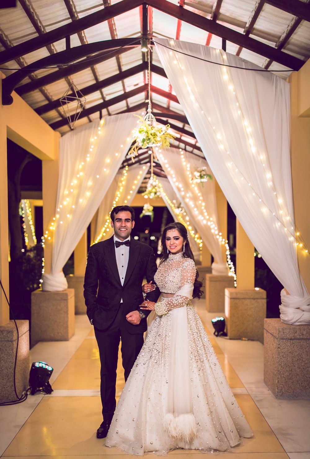 Photo of A lovely couple on their wedding amidst beautiful decor.