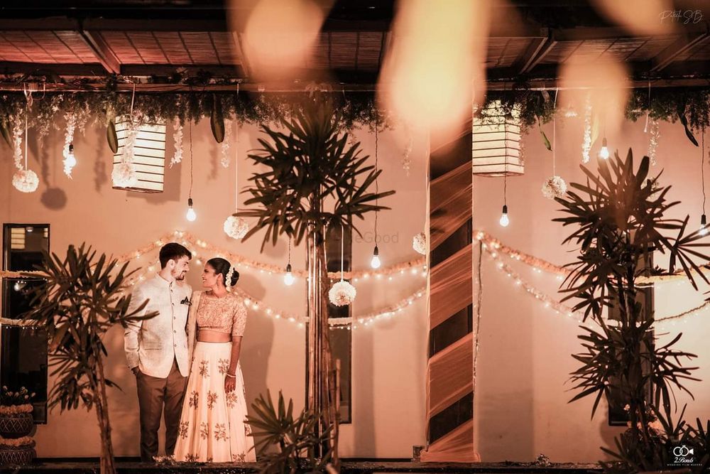 Photo of A beautiful fairy lights backdrop with the couple covered in soft lights!