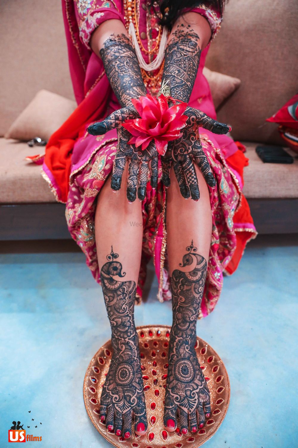Photo of Bridal mehendi on feet and hand with flower