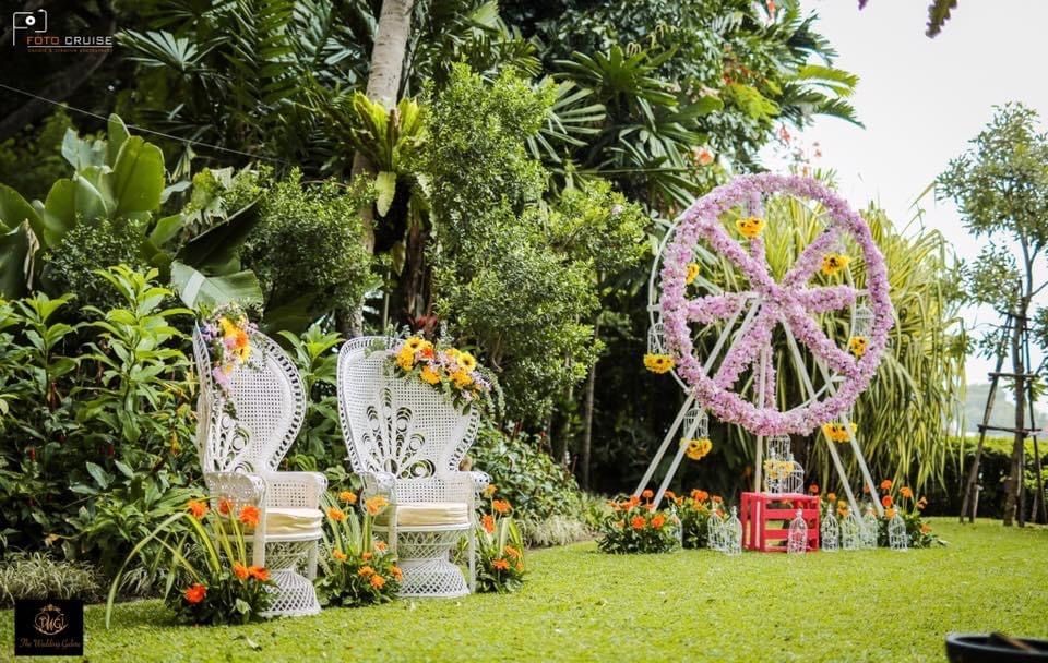 Photo of elegant whimsical mehendi seating idea and floral decor
