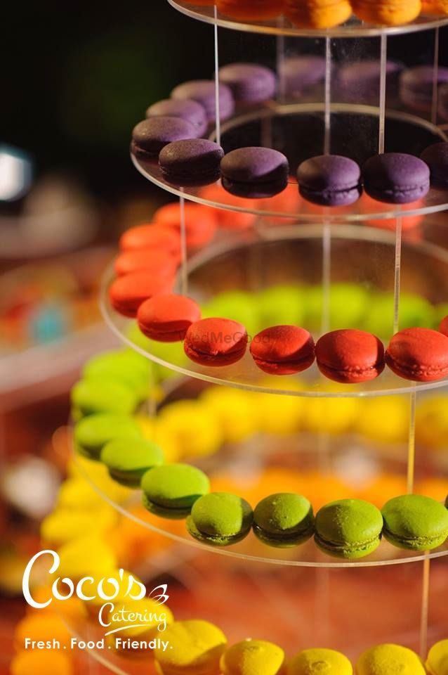 Photo of Macaroons on display at dessert table