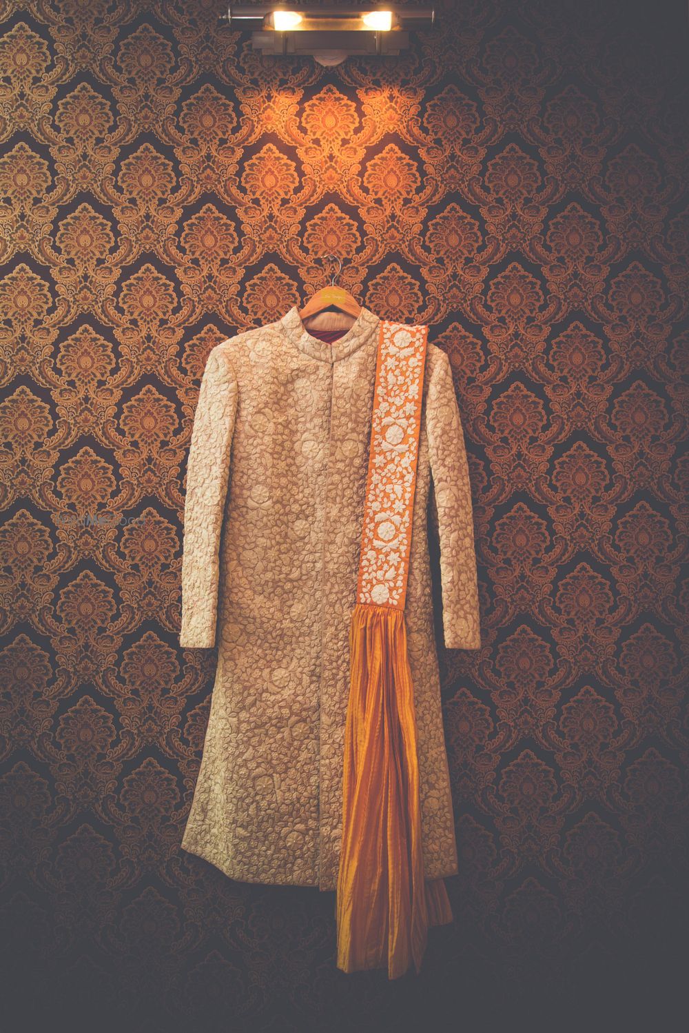 Photo of cream sherwani