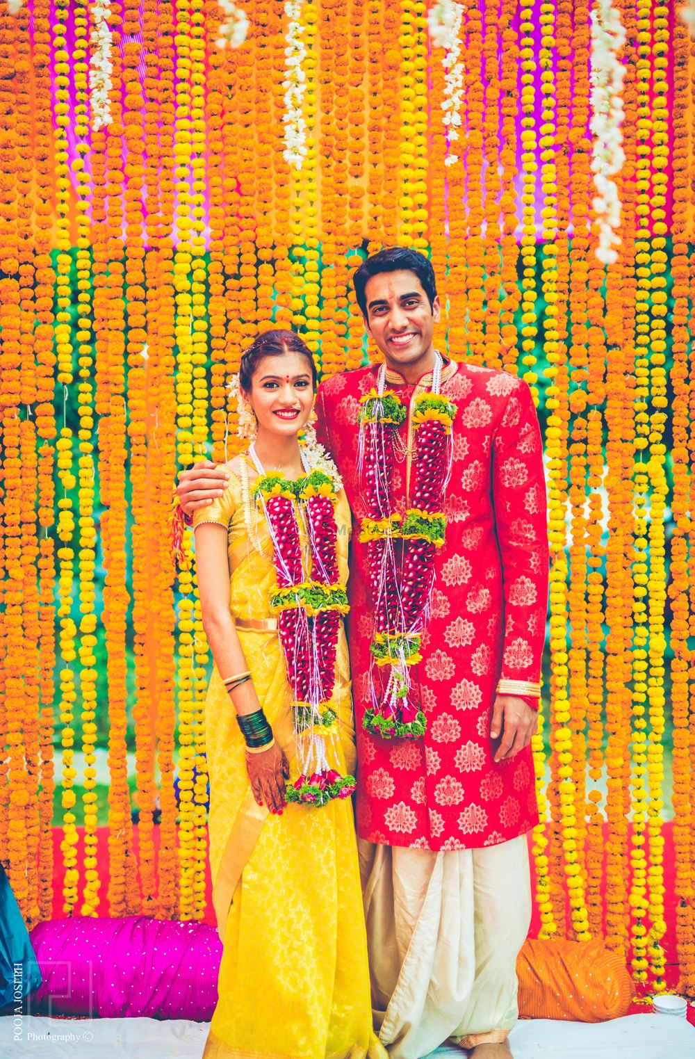 Photo of Telugu wedding couple with floral strings