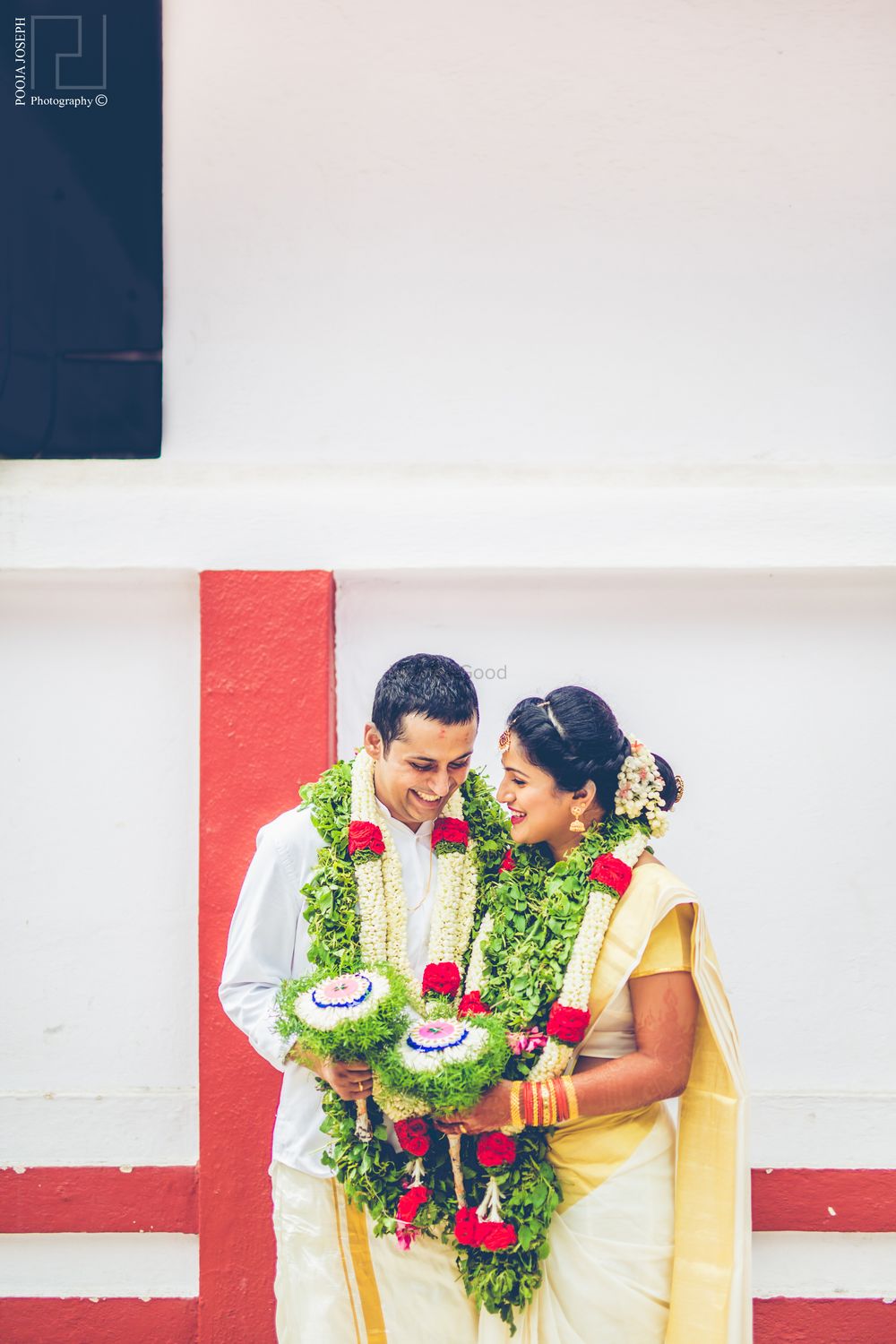 Photo of South Indian Wedding Couple with Green Jaimalas