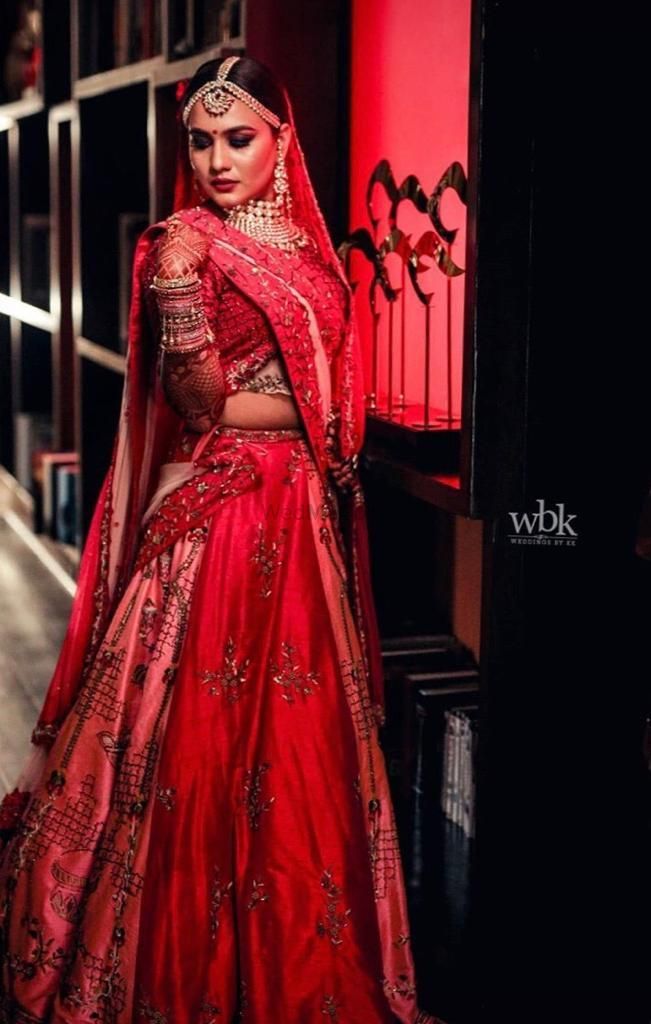 Photo of Pretty red and printed pink lehenga for wedding