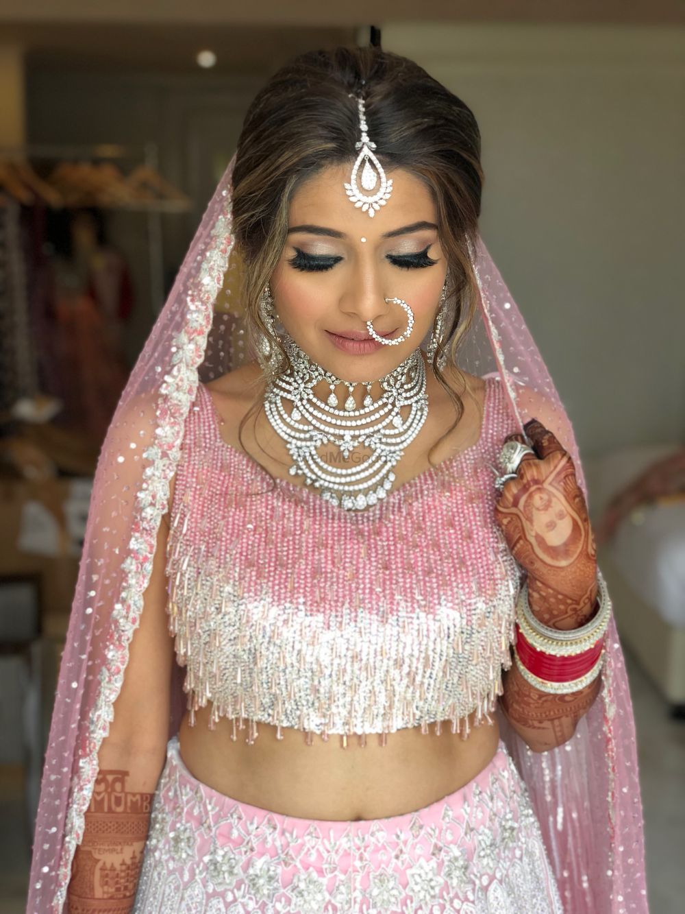 Photo of Offbeat bride in unique lehenga and jewellery