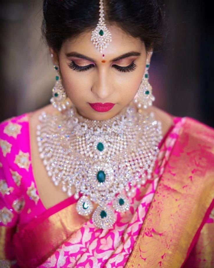 Photo of Diamond and emerald oversized necklace for south indian bride