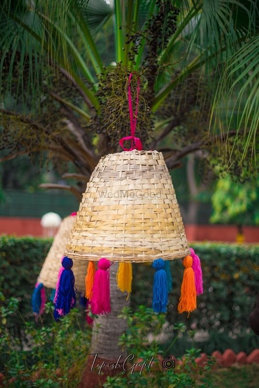 Photo of Upturned cane basket with tassels