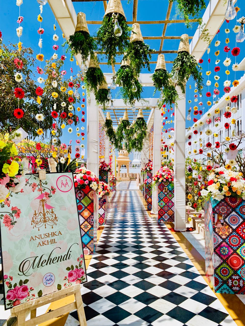 Photo of Quirky mehendi decor entrance idea with upturned pots