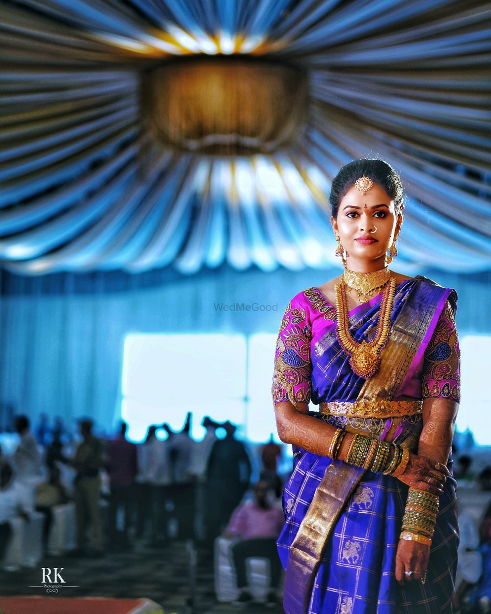 Photo of A south Indian bride in temple jewellery and kanjeevaram saree