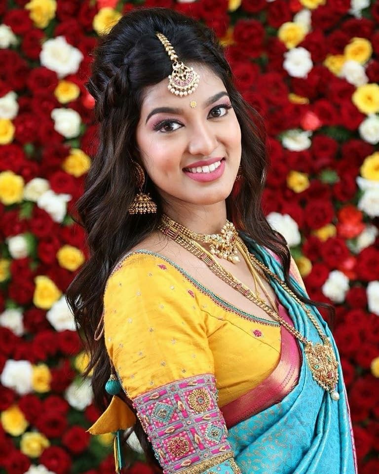 Photo of A south Indian bride in a saree with a unique blouse