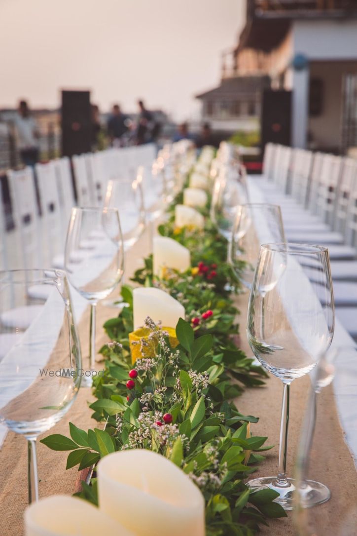 Photo of Flowers with Candles Table Decor