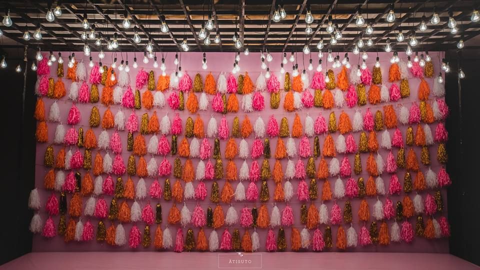 Photo of Stage decor photobooth with tassels for mehendi