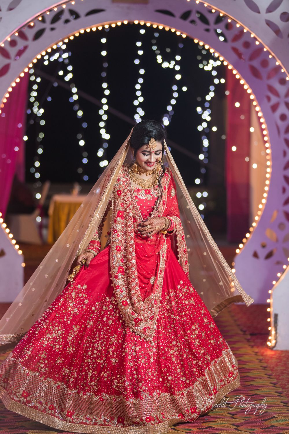 Photo of Red and gold bridal lehenga