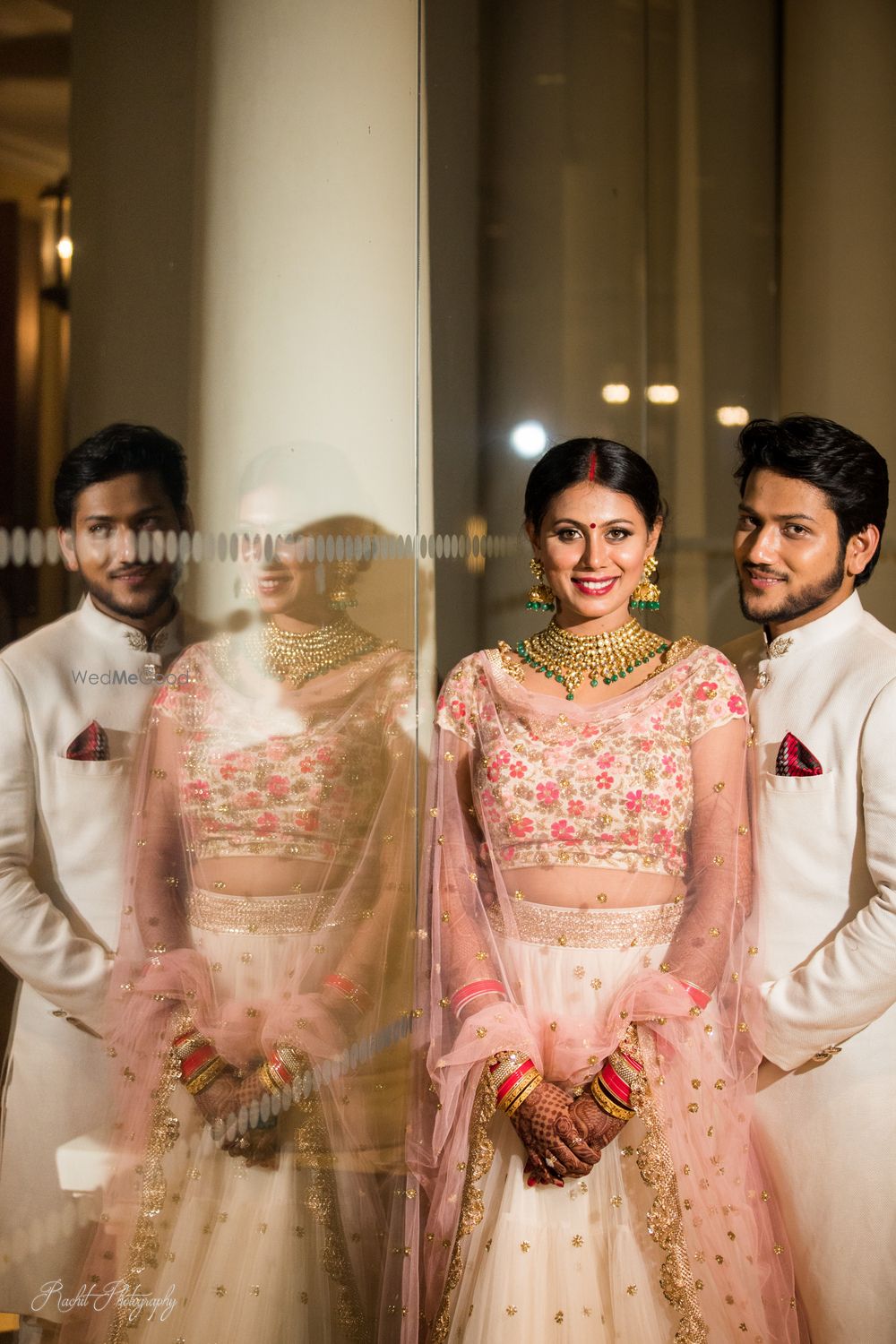 Photo of A couple in coordinated outfits poses for the camera