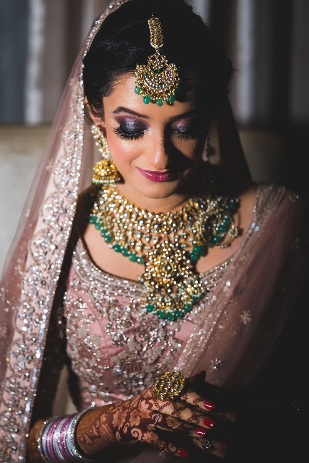 Photo of Bridal portrait with smokey eyes and contrasting jewellery