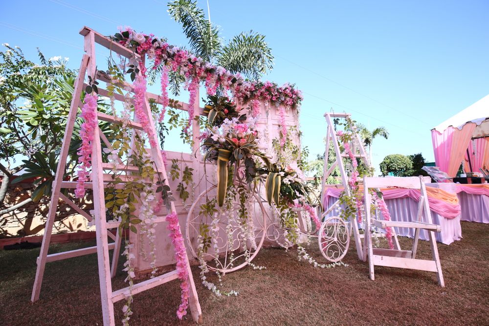 Photo of A floral photobooth decor at a mehendi ceremony