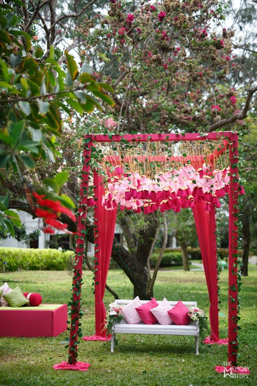 Photo of Mehendi photobooth cum seating idea with canopy