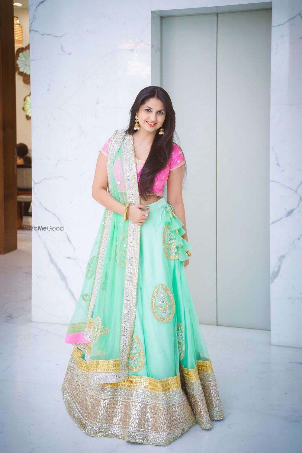 Photo of Fuchsia Pink and Sea Green Lehenga