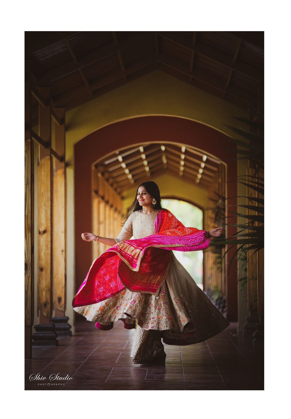 Photo of A bride to be twirling in a suit