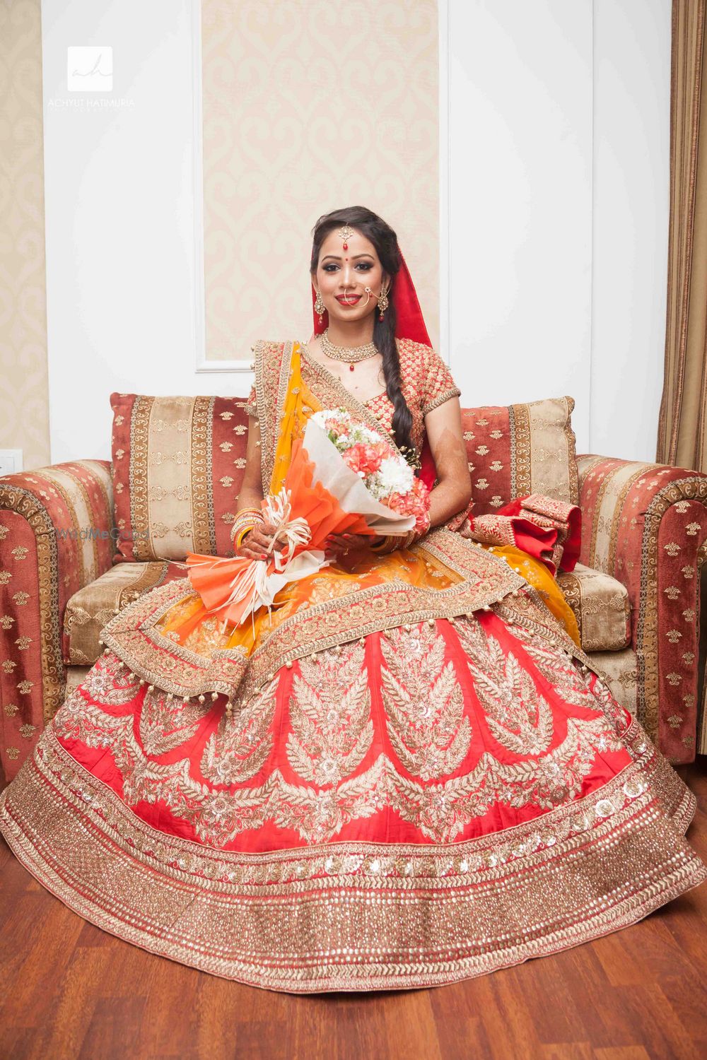 Photo of Mustard and Coral Lehenga with Handcrafted Zardozi Work