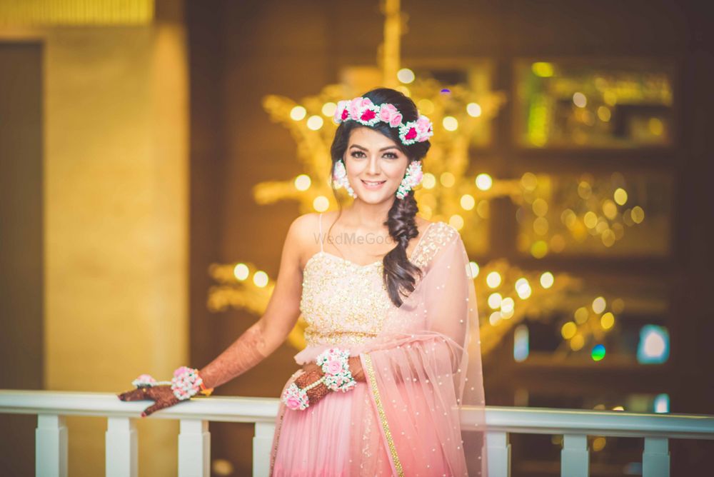 Photo of Mehendi bridal look with flower crown