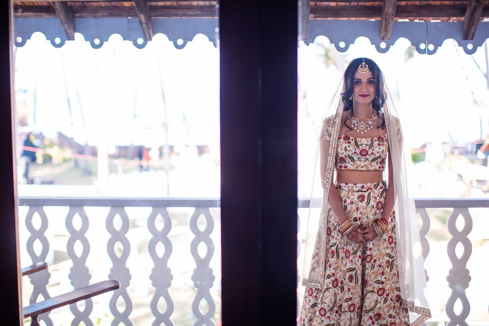 Photo of Bride with open hair and simple floral embroidery lehenga