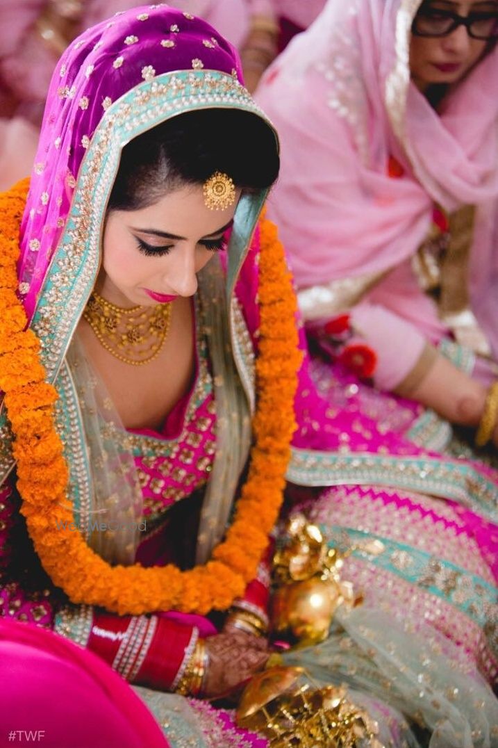 Photo of Fuschia color bridal Lehenga