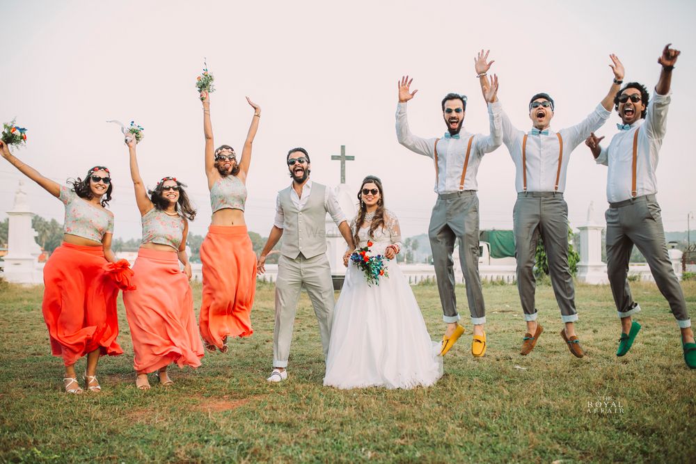 Photo of Colour Coordinated Bridesmaids and Groomsmen