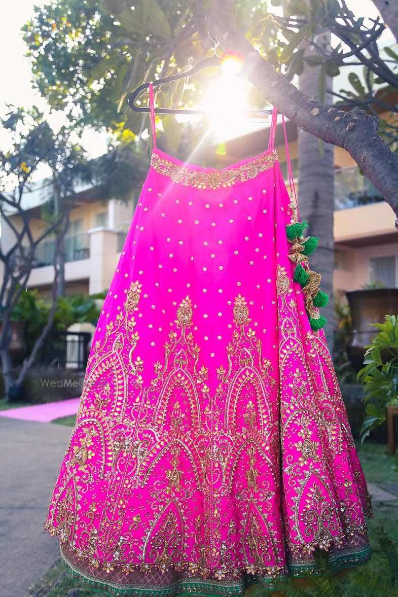 Photo of Fuchsia Pink Lehenga on a Hanger