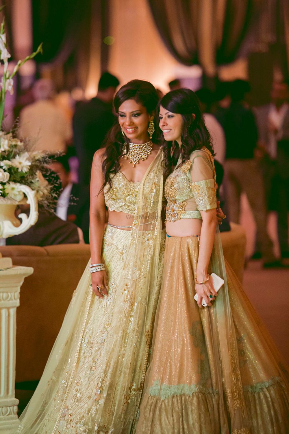 Photo of sister of the bride pastel cold shoulder lehengas