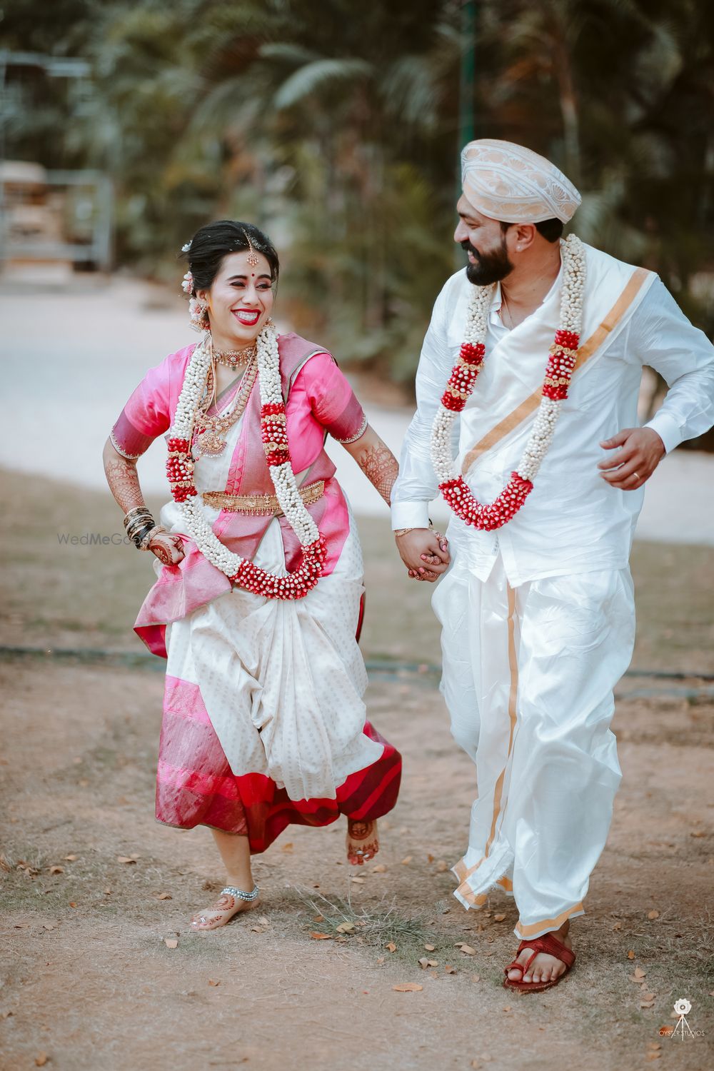 Photo By Oyster Studios  - Photographers