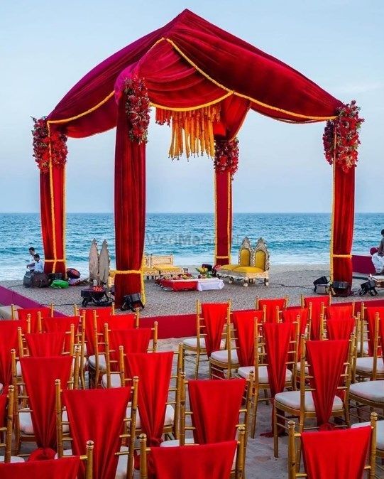 Photo of A simple yet stunning mandap decor setup by the sea side