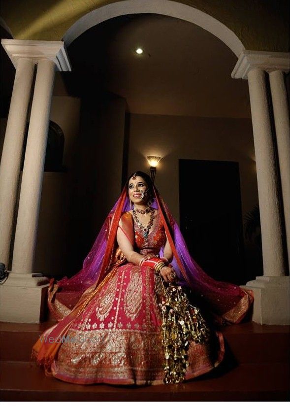 Photo of Maroonish red banarasi lehenga with contrasting dupatta