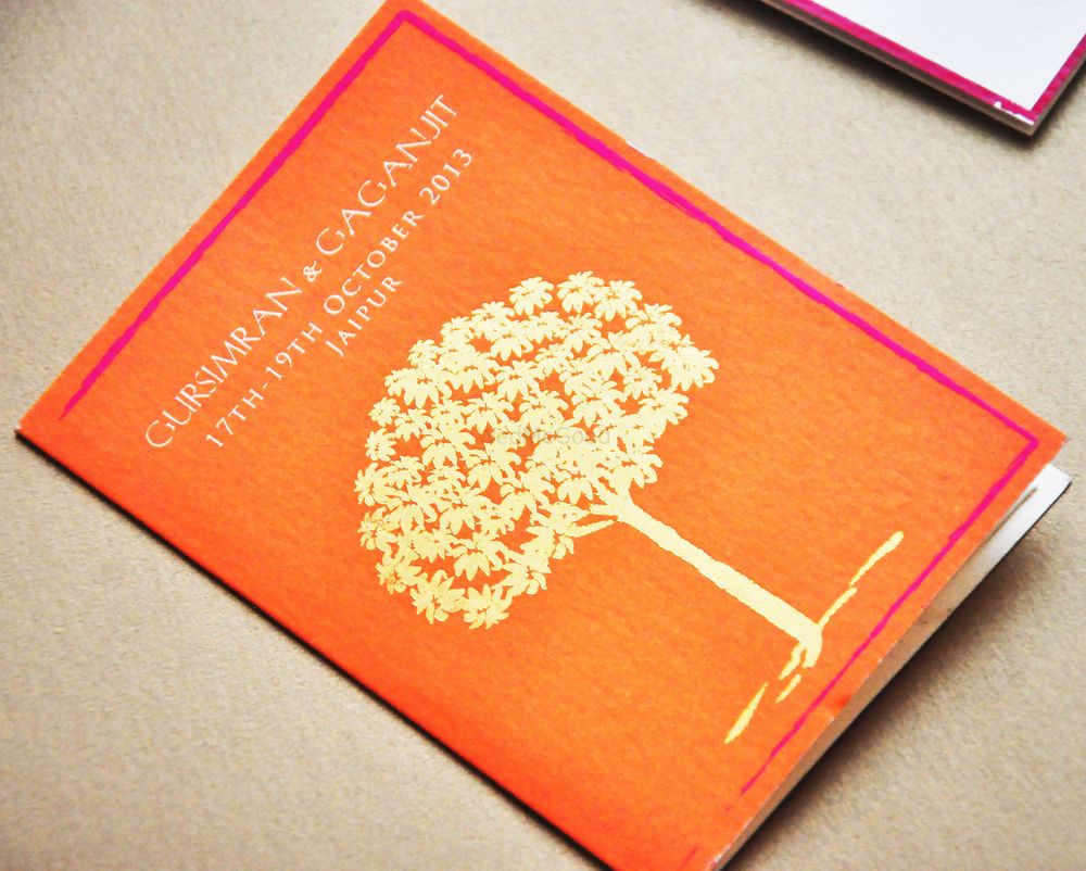 Photo of orange tree of life wedding card